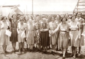 Rabaul Nurses in Manila 1945 — Bowie waving second from left. AWM neg. 19146